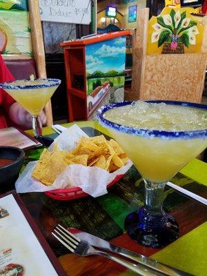 Huge margaritas and chips in salsa