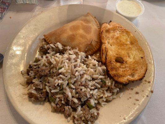 Meat pie, French bread, dirty rice