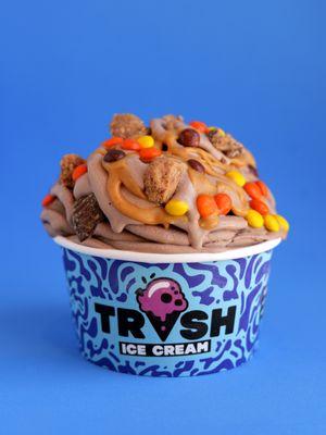 #1: What's Love Got To Do With It: chocolate ice cream with peanut butter cups, Reese's Pieces, and ooey gooey peanut butter drizzle.