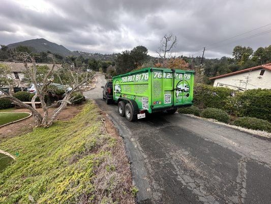 Helping a customer In Escondido taking items to the donation center