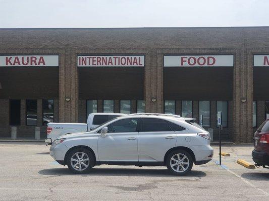 Festus' Lexus car.in lot....maybe homeless  yellow teeth and tire up afro  Lexus Infiniti auto