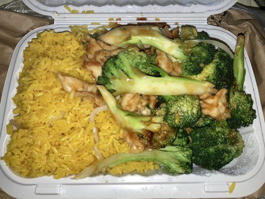 Chicken and broccoli in brown sauce with fried rice