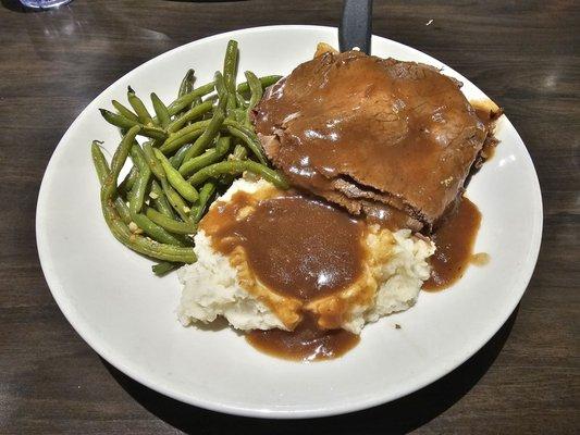 Hot roast beef sandwich.