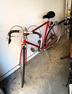 Bike before restoration, wouldn't shift, had tennis grip around handlebars to keep them from falling apart and rusted all over.