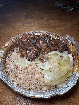 Oxtails with rice and peas & cabbage