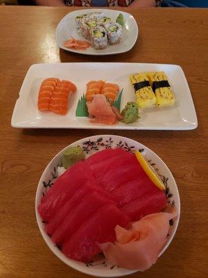 Tekka don tuna bowl, sake (salmon), tamago (egg), and a california roll.