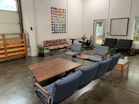 In this photo from our Belmont showroom you can see PDX Airport Benches, our coffee table, sit-stand and Portland Textile Month exhibit.