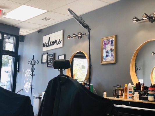 A barber's station with ring lights!