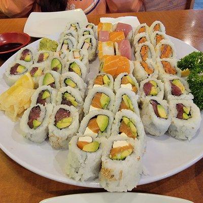 Rainbow roll 5 stars.  Tuna and avocado is my new favorite.  Spicy tuna great  Philadelphia roll great.