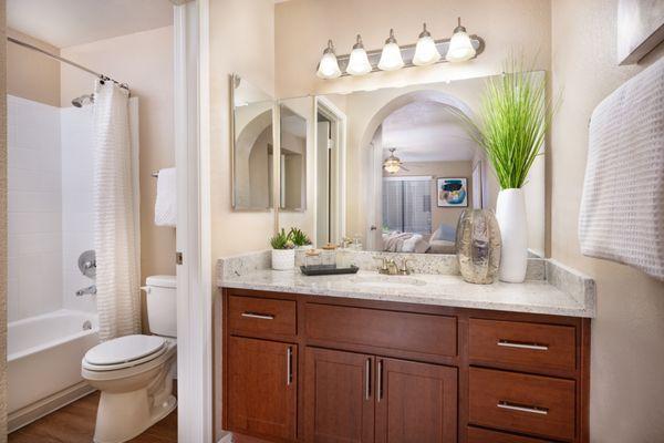 Bathroom with shower and tub at The Palisades in Paradise Valley