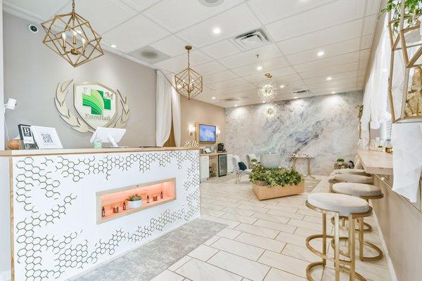 front desk reception and waiting area inside of spa