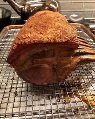 The finished product of our porcelet after being brined, slowly cooked and seared to achieve a crispy skin and incredibly juicy center.