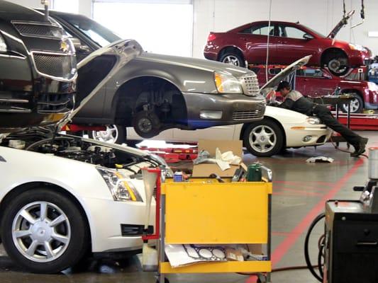 Factory trained GM Certified, ASE Certified technicians work on vehicles at Mike Young Buick GMC