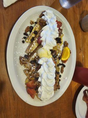 French toast w fruit walnuts and whipped cream