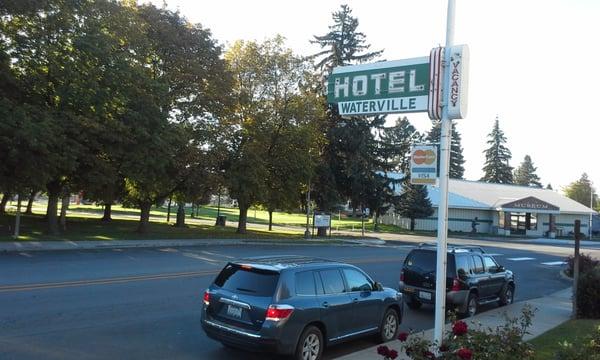 view from the porch of the cool sign, park and museum.