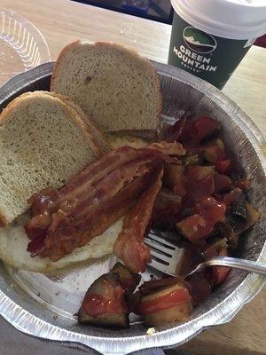 2 egg platter with home fries, bacon, and rye toast with butter