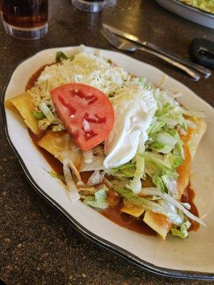 Cheese, chicken, bean and beef enchiladas