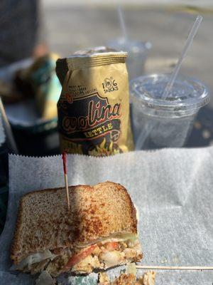 Half of my turkey melt, chips, and a water.