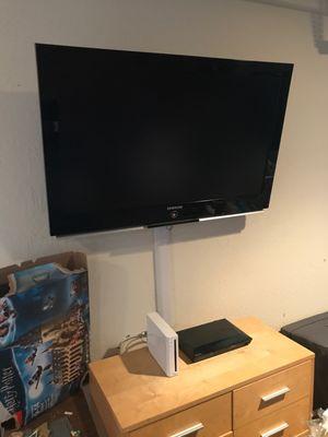 40 inch in playroom with wires outside the wall and tilted mount