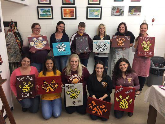 The teachers from Mokena stopped in to paint their school logo!