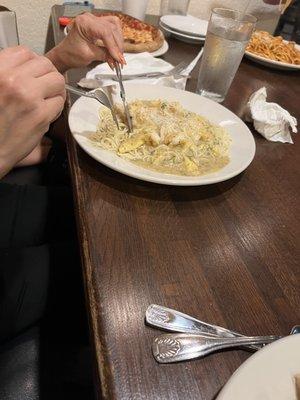 Shrimp with white wine sauce over angel hair pasta