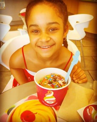 Pure glee!! Chocolate Froyo with M&Ms, sprinkles, and chocolate rocks for the princess!!