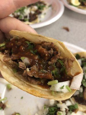 Asada(steak) taco with rojo salsa