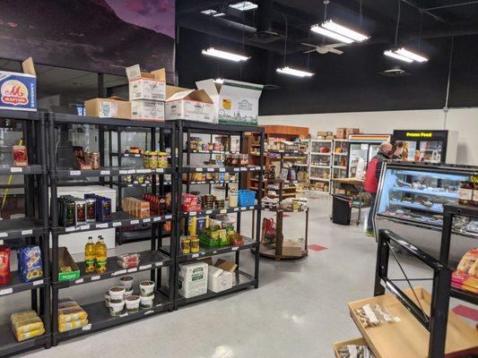 More shelves and the deli case.