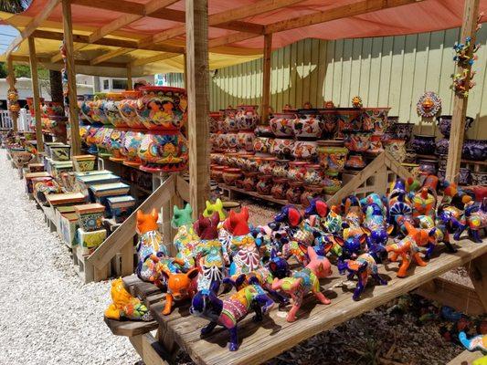 Rows of decorative clay pots and ornaments!