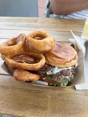 BANG BANG BURGER: grilled jalapeños, onion, pepperjack cheese, lettuce, tomato, pickles and bang bang sauce.