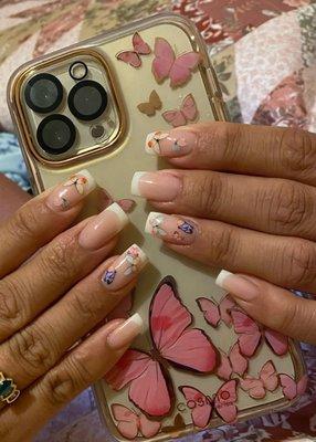 Pink and white nails  with butterfly  stickers