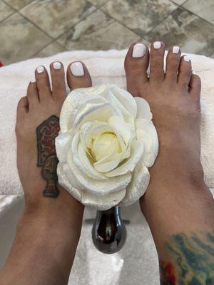 White regular nail polish pedicure