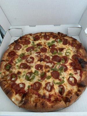 Pepperoni onion green pepper well done.