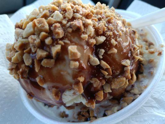 Scoop banana peanut butter ice cream with hot fudge and chopped peanuts