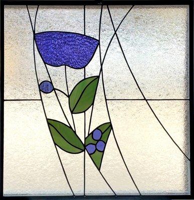 A simple but elegant unique Art Deco stained glass flower panel