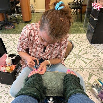 Ann doing my pedicure.