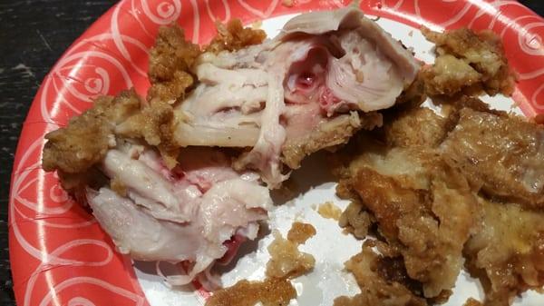 "Cooked" fried chicken purchased at Safeway #1668 that is clearly raw inside!