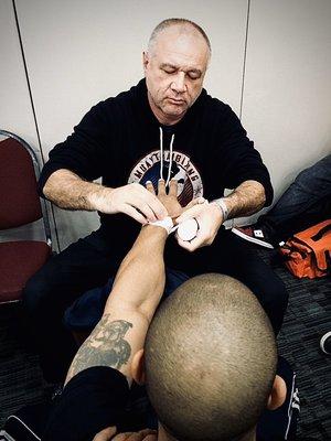 George wrapping hands before the fight.