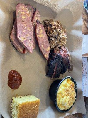 Pick 3. Brisket, pulled pork, jalapeño cheddar sausage. Side of Mac and cheese