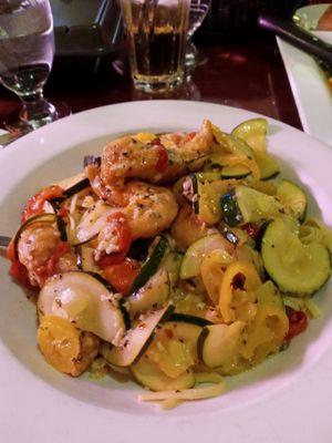 Chicken with roasted peppers, hot pepper rings and zucchini over linguine