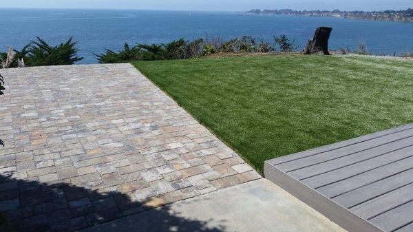 Paver and artificial turf installations.