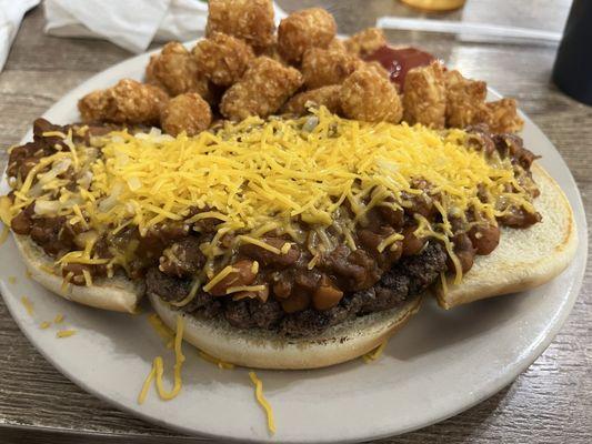 Chili Cheeseburger (open faced) w/ Tots well done.