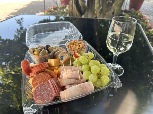 Try one of our charcuterie boards paired perfectly with a glass of your favorite Merritt Wine!