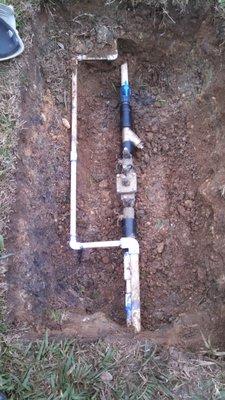 Repaired mainline and brought doublecheck valve up to code.