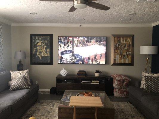 Home theater project: mounted tv and ceiling speakers.