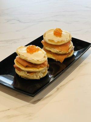 Our signature short stake pancakes... Lox and whitefish salad on mini pancakes