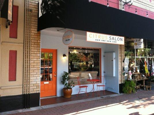 Custom Storefront Signage including window vinyl,  custom blade sign w/ dimensional letters.