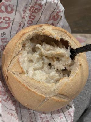 Delicious clam chowder in super soft bread bowl