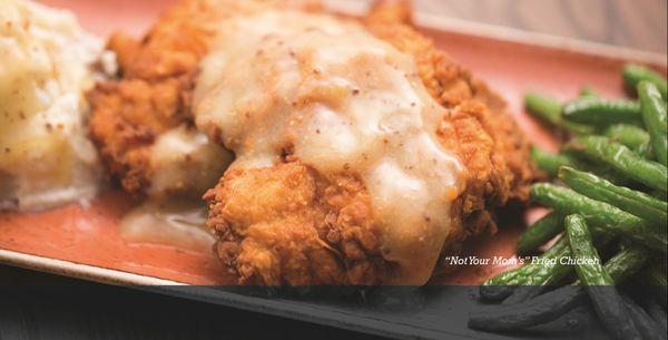 "Not Your Mom's Chicken"
Crispy chicken breast smothered in chicken gravy