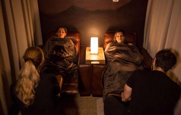 Friends enjoying a Den Massage in the Zen Mountain Den